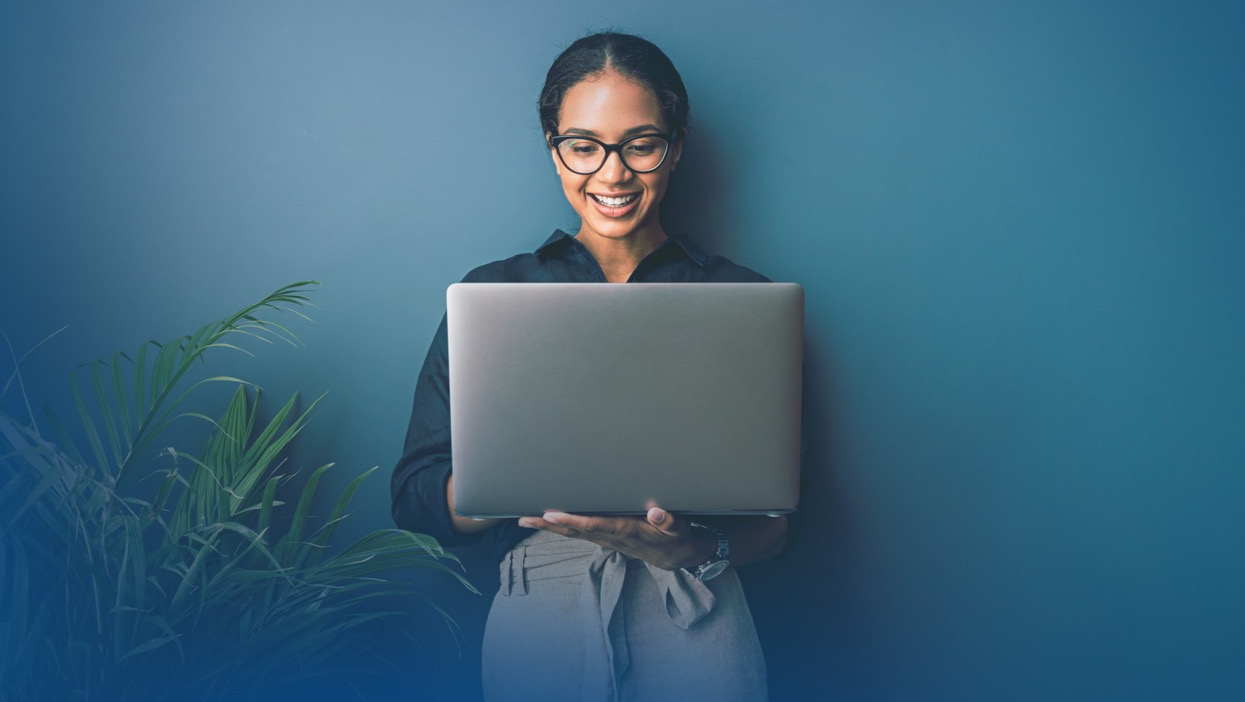 A real person using a real laptop.